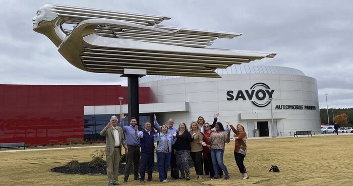 Savoy BOD in front of car